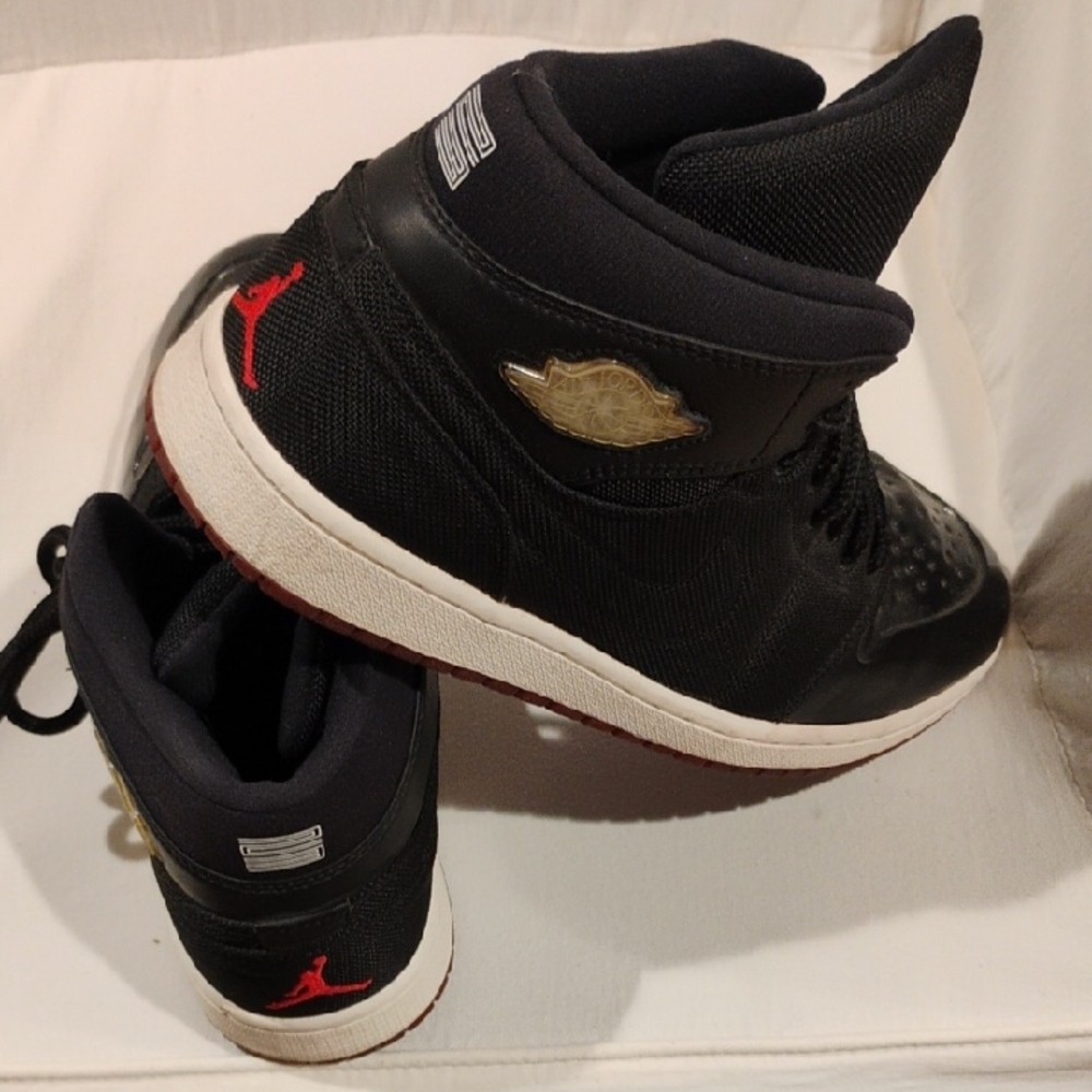 Nike Air Jordan Black and Red High-Tops M11